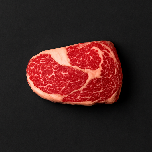 Raw gluten-free beef cube roll, boneless with lean texture and light marbling, placed on butcher tray with certified gluten-free label